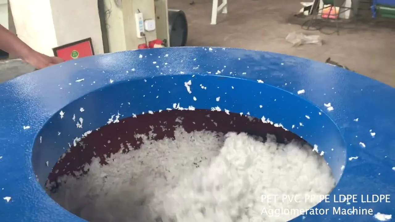 Plastic film agglomerator processing lightweight recycling material